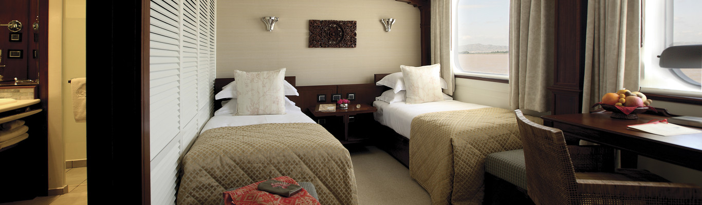 Belmond River Cruises Road to Mandalay deluxe cabin.jpg